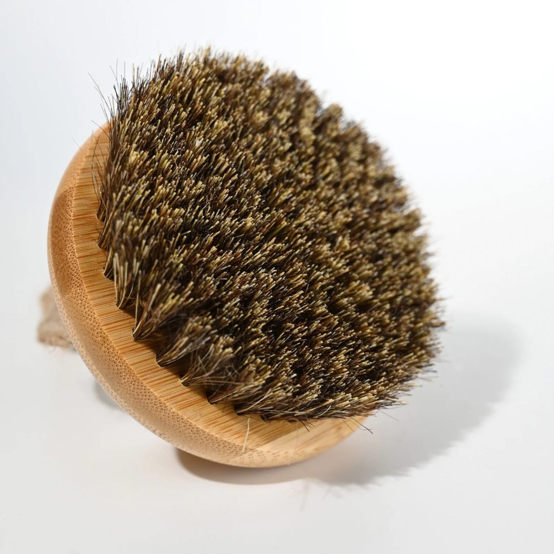 Exfoliating Dry Body Brush- light natural Bamboo  body, with brown and beige natural bristle's on white back ground. 