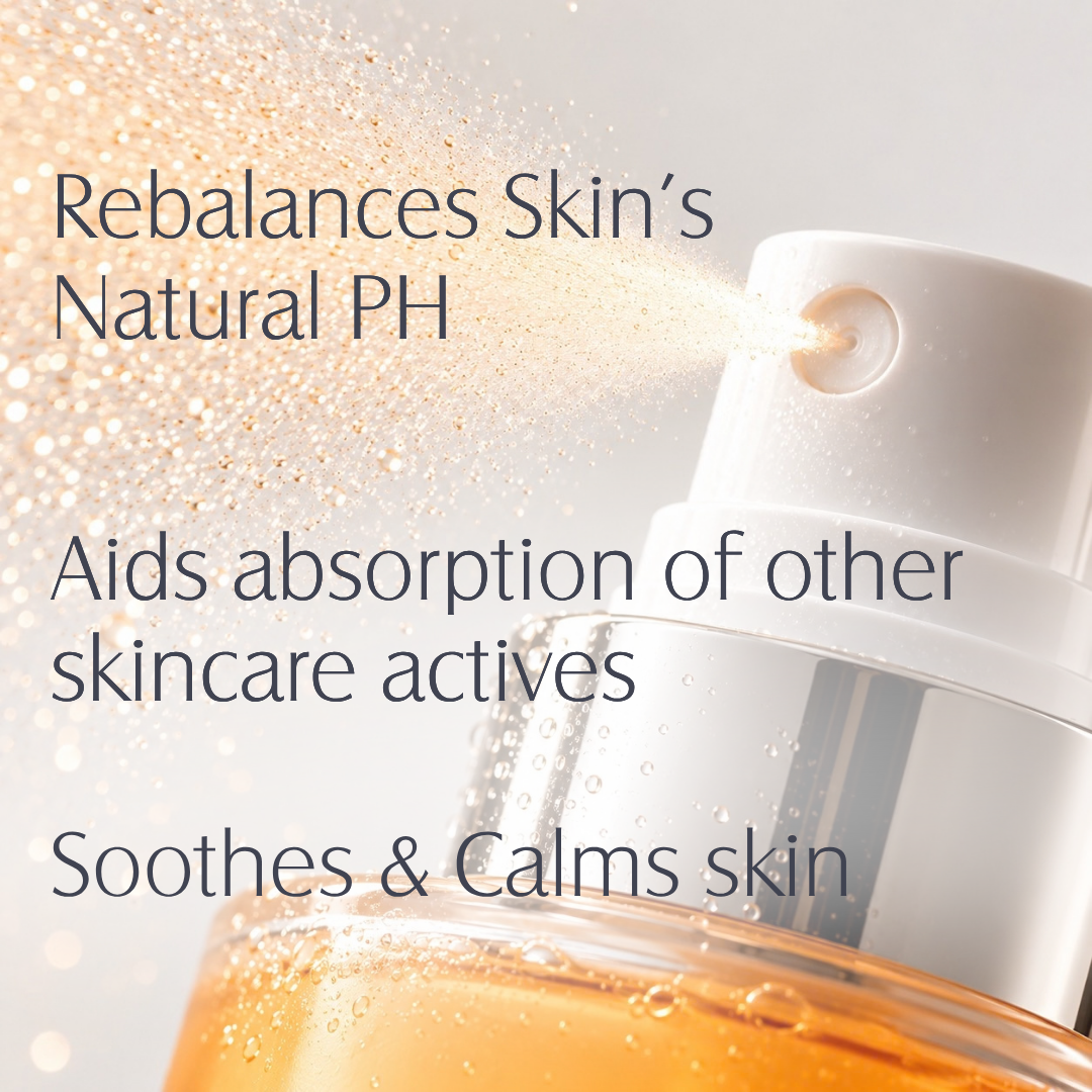 Close-up of a skincare pump bottle spraying a golden liquid, with text overlays reading 'Rebalances Skin's Natural PH', 'Aids absorption of other skincare actives', and 'Soothes & Calms skin'.