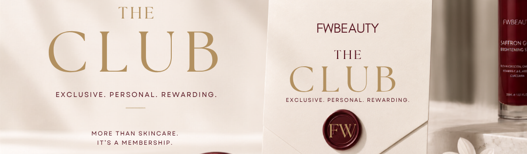 FW Beauty 'The Club' membership card with skincare products on a satin surface.