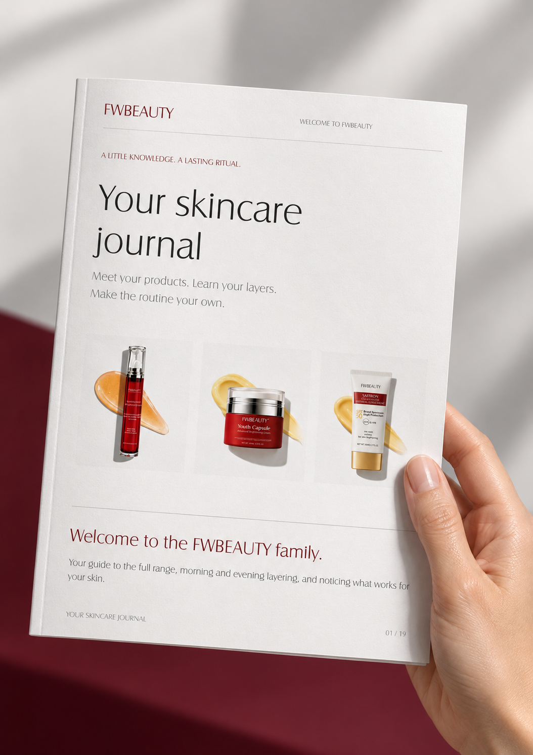 FWBEAUTY skincare journal held in hand