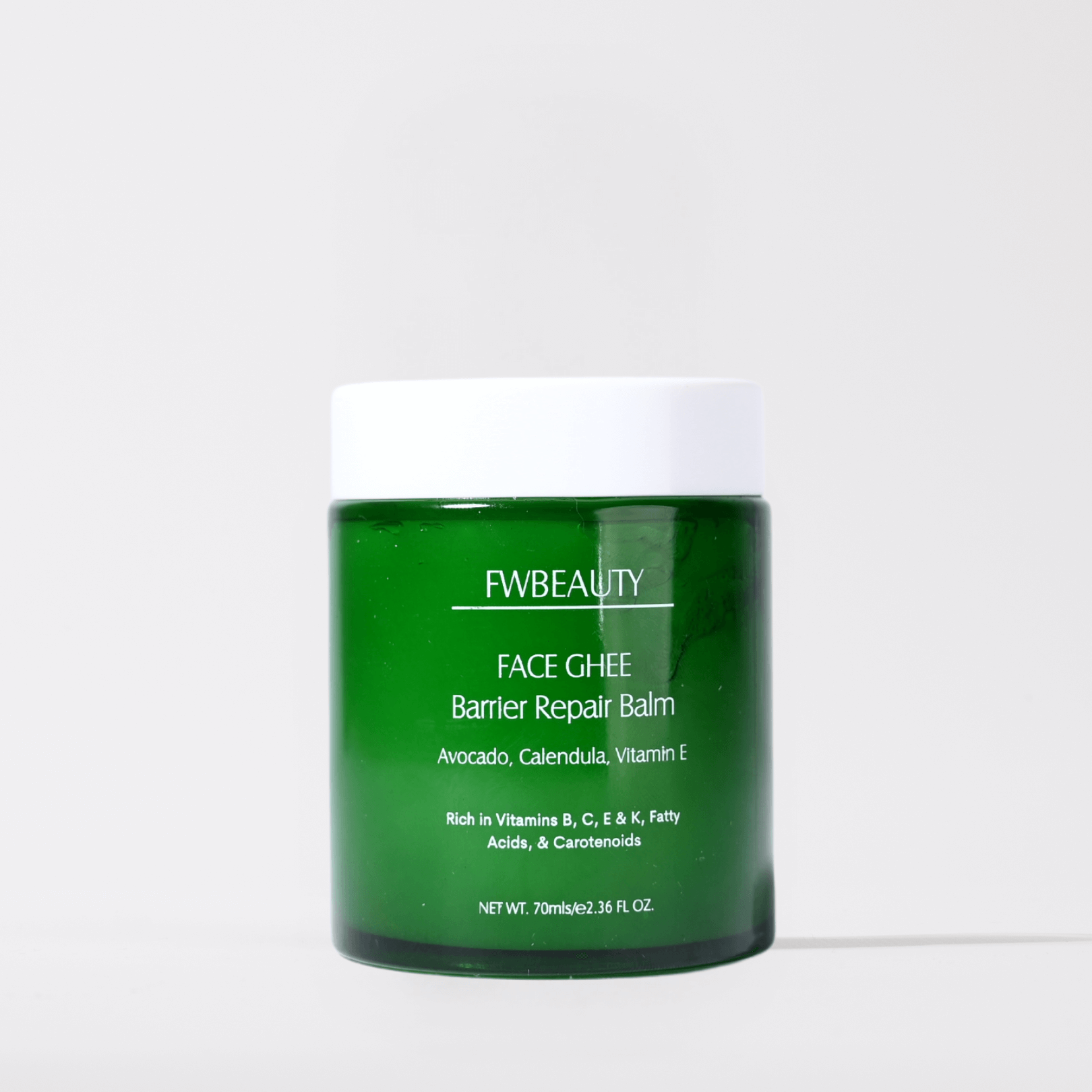 Face Ghee Barrier Repair Balm FWBEAUTY
Green gladd cosmetic jar, white lid, 'FWBEAUTY' Branding on white back ground. 