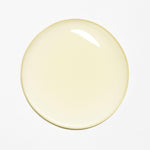 Lash and Brow - Swatch. FWBEAUTY 
Circular clear off white oil product on white back ground. 