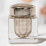 Lip rescue Skin memory collection.
clear cosmetic jar with chrome lid and finish,  branded 'FWBEAUTY' on white back ground. 