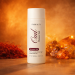 FWBeauty Oud Shower Gel bottle on a warm-toned background