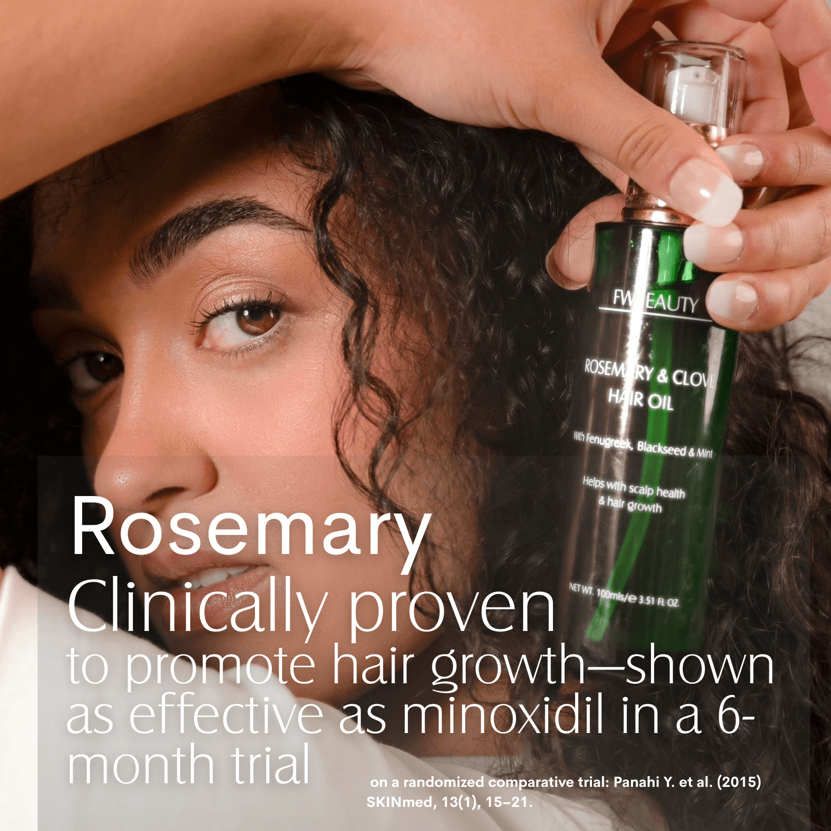 Person holding a bottle of Rosemary & Clove hair oil with text about its effectiveness.