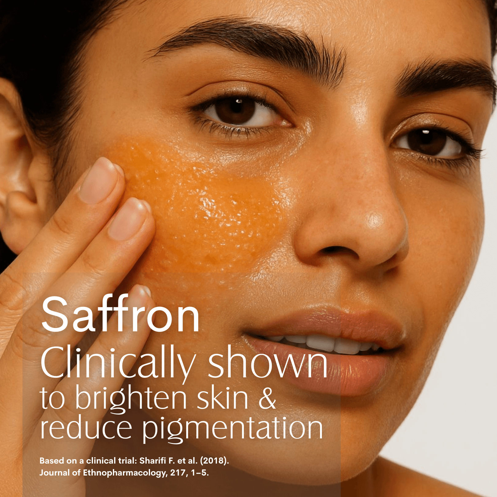 Saffron Cleansing Balm FWBEAUTY 

person applying Orange colour balm product to face with whit text on white back ground. 