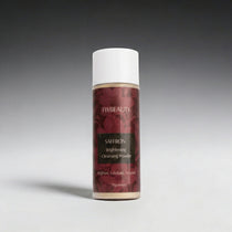 Saffron brightening cleansing powder bottle with red label on gray background